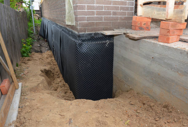 Happy homeowners after waterproofing job in Beachwood